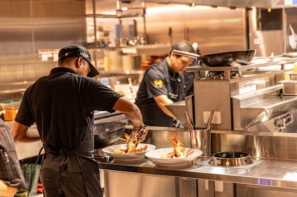 Sitting at one of the bar stools gives you a front-row seat to the action.