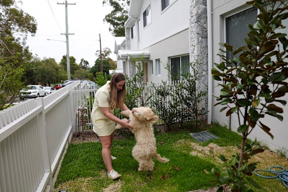 Howell, pictured with her dog Evie, says she found price guides to be a source of frustration.