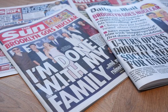 UK newspaper front pages display stories and images on the Beckham family feud.