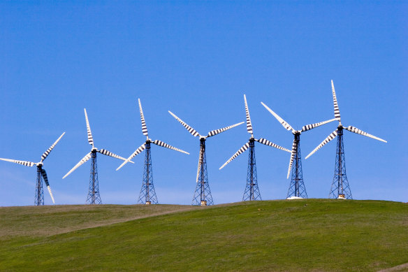 Wind turbines with a stripy contrast pattern to make the blades more visible to birds.