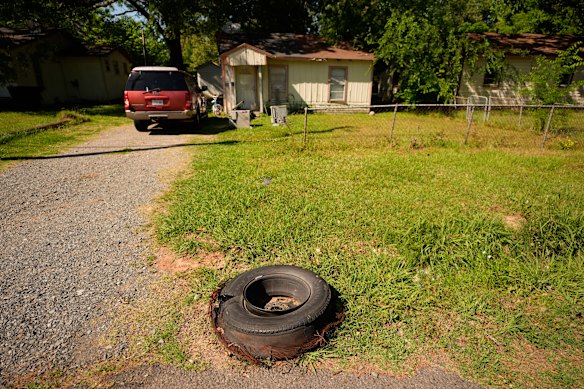 A vehicle is parked outside one of the locations of the shooting.
