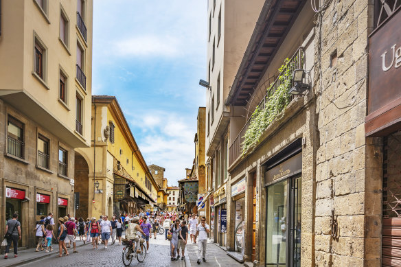 The medieval Ponte Vecchio (old bridge) seen from Via Por Santa Maria.