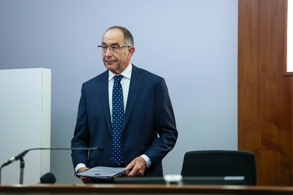 Commissioner Chris Kourakis takes his seat at the Melbourne Magistrates’ Court on Wednesday.