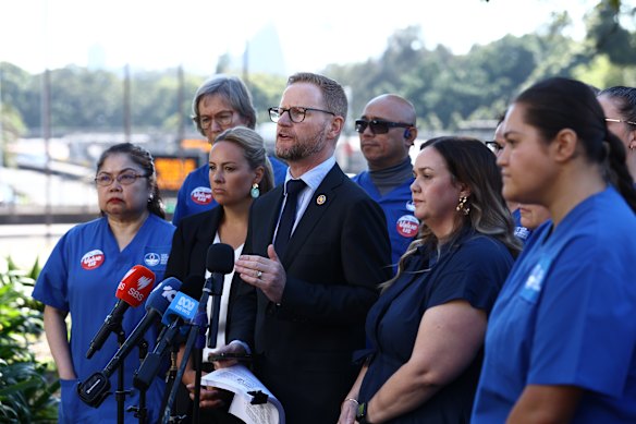 NSW Nurses and Midwives’ Association general secretary Michael Whaites and union members speak to the media after the Industrial Relations Commission’s decision.