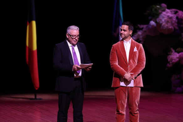 Andrew Ross and Karl Schmid speak at the memorial service.