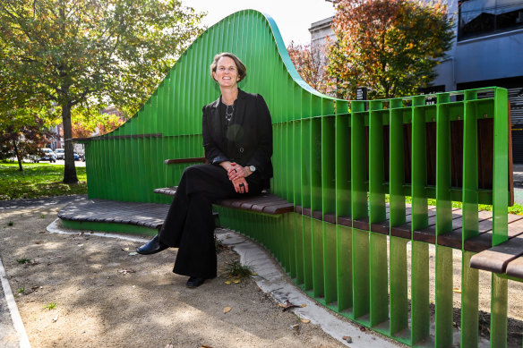 Obelia Tait uses the Carlton “smart bench” she helped conceptualise.