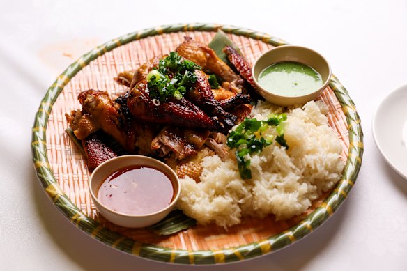 Ga nuong xoi nep (whole grilled chicken). 