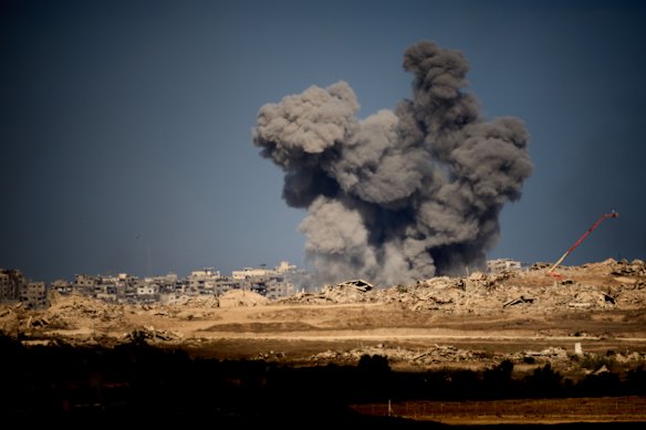 Smoke rises following an Israeli military strike in the Gaza Strip on Friday.