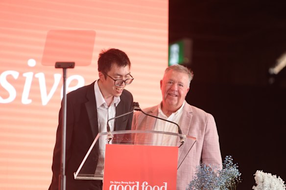 Lettuce Eats participant Darren Mann accepts the Food for Good award with Omnia Inclusive CEO Matt Little.
