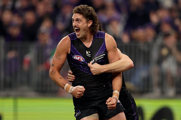 Luke Jackson of the Dockers celebrates a goal.