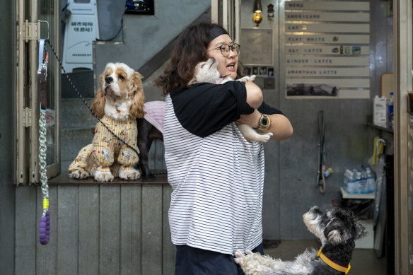Maggie Gu, 30, owner of Pushing Coffee, a hole-in-the-wall style cafe where customers drop off their dogs for the day.