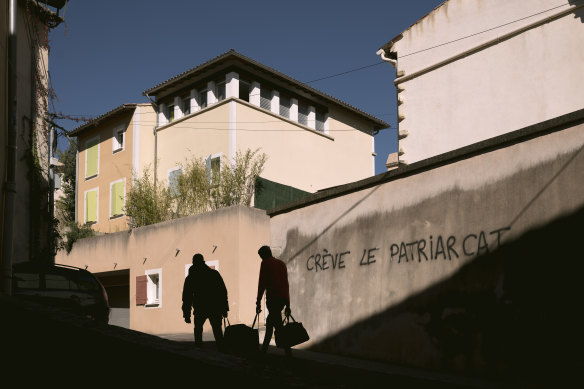Graffiti reading “Destroy the patriarchy” on a wall in Mazan, the small town where Dominique Pelicot and his wife lived.