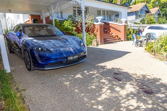 A car was parked in the driveway on Wednesday. Blood was also spotted.