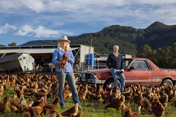 Kristen McLennan at her free-range chicken farm in Kangaroo Valley with filmmaker Ian Darling, whose documentary The Valley, about silence and solitude in a rural community, will premiere at the Sydney Film Festival in June.