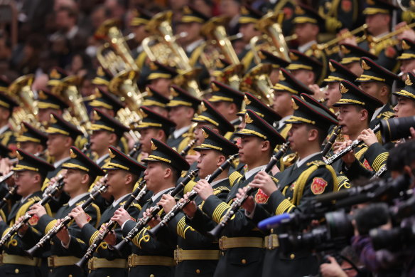 The Chinese People’s Liberation Army performs during the National People’s Congress