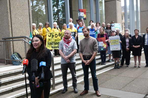 Lydia Shelly, vice president of the Council for Civil Liberties, Zack Schofield of Rising Tide and Josh Lees of Palestine Action Group outside the NSW Supreme Court this month.