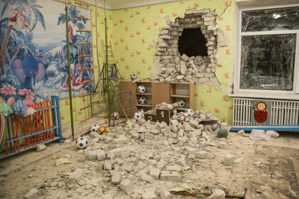 The aftermath of shelling on a kindergarten in the Russian-separatist settlement of Stanytsia Luhanska, Ukraine, on Thursday. The US says the shelling was staged by Russia as a pretext for invasion.