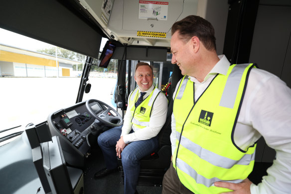 In the driver’s seat of a public transport revolution in the south-east: Premier Steven Miles and Lord Mayor Adrian Schrinner.