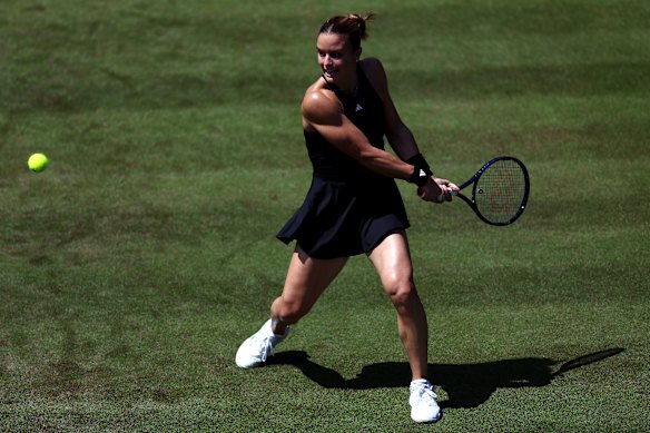  Maria Sakkari plays a backhand against Yulia Putintseva.
