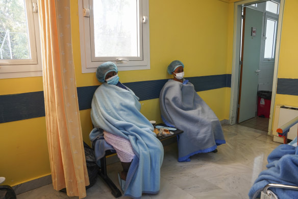 Migrants at a hospital after the deadly sinking of a boat.