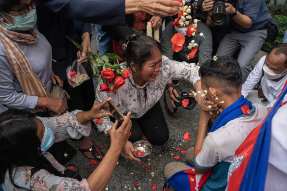 Prum Chantha, the mother of Kak Sovann Chhay, the 16-year-old son of an opposition politician, celebrates his release from prison in Phnom Penh, Cambodia, in November.