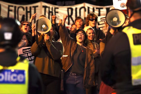 Protesters were heavily outnumbered by the police presence, which reportedly included federal police, in Hawthorn East.