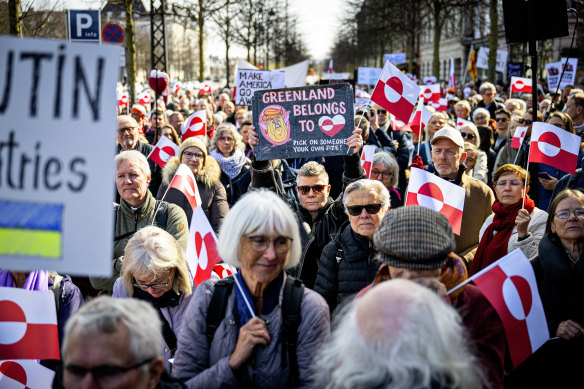 Demonstrators hold Greenland flags as they protest in front of the US embassy in Copenhagen at the weekend. 
