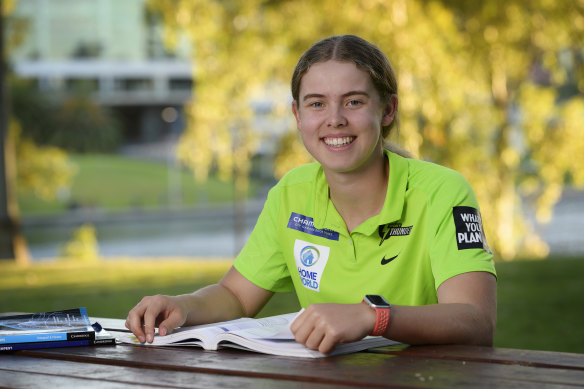 Phoebe Litchfield gets in some study before practice. 