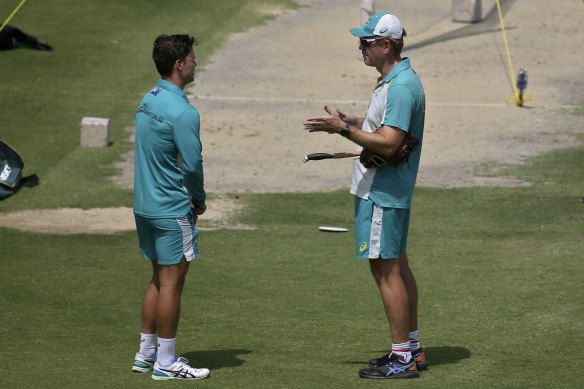 Andrew McDonald talks to Mitchell Swepson during the tour of Pakistan.