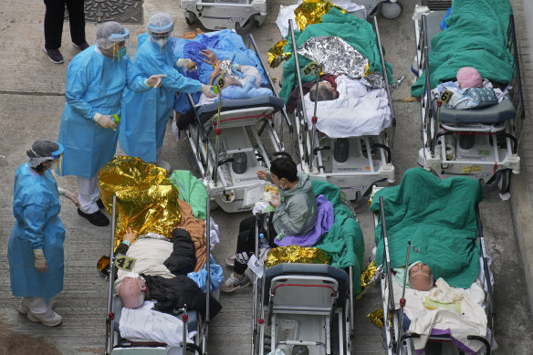 Patients wait at a temporary holding area outside Caritas Medical Centre in Hong Kong.