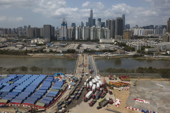 A construction site for coronavirus isolation facilities and a temporary bridge linked China’s Shenzhen and Hong Kong’s Lok Ma Chau cities in Hong Kong, 