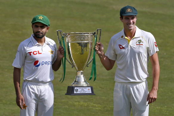 Pakistan skipper Babar Azam and Australia captain Pat Cummins with the Benaud-Qadir Trophy. 