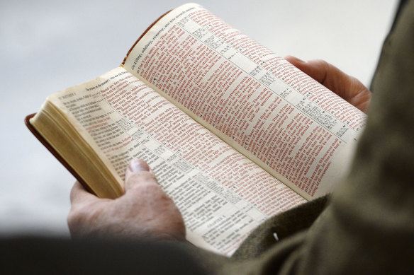 The Bible, pictured at a Utah Capitol reading in 2013, has been banned at schools in the Davis School District north of Salt Lake City.