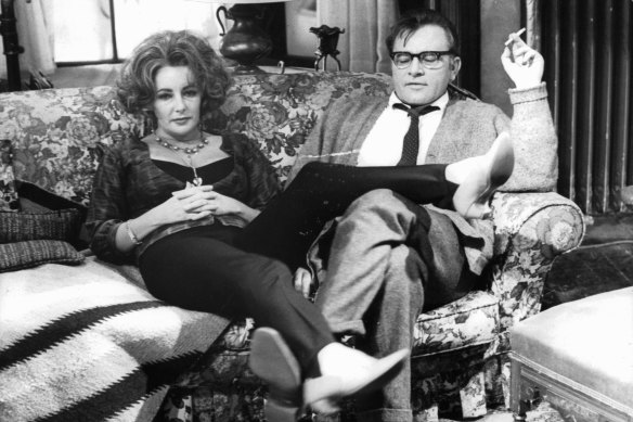 Elizabeth Taylor on the couch with Richard Burton in a scene from the 1966 film of Who’s Afraid Of Virginia Woolf?