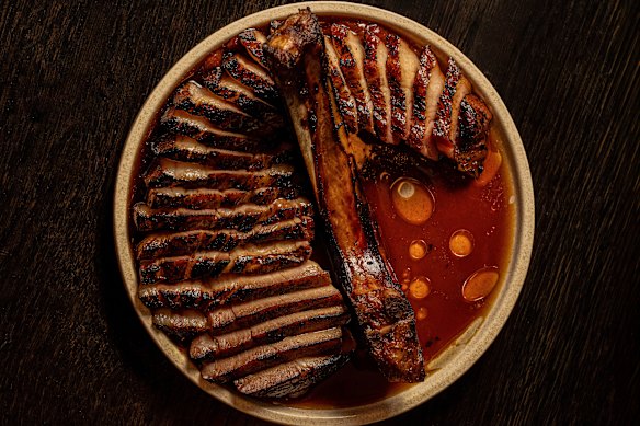 Dry-aged pork cutlet with sweet and sour rhubarb and rainforest tamarind at Ashe.