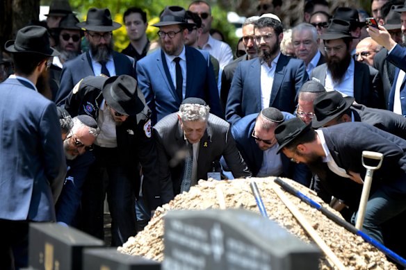Rabbi Eli Schlanger was laid to rest at Rookwood Cemetery.