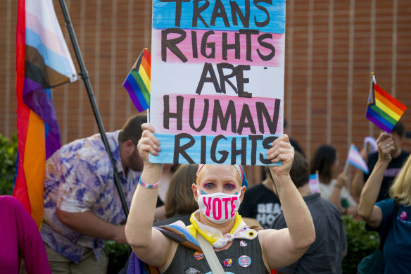 Parents protest against a Los Angeles school district ruling requiring teachers to inform parents if their child identifies as transgender.
