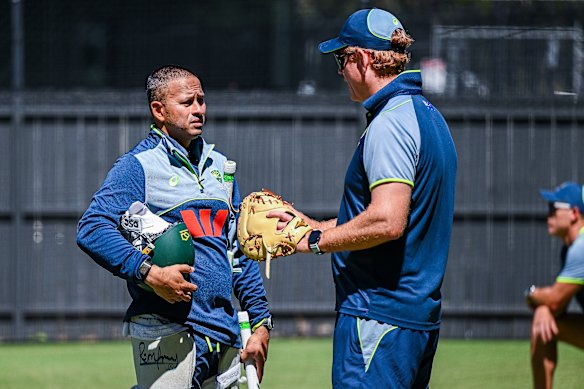 Usman Khawaja, pictured on Tuesday speaking with Australian coach Andrew McDonald, has been overlooked for the Adelaide Ashes Test.