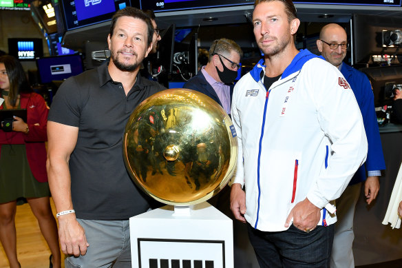 Hollywood star Mark Wahlberg and former F45 CEO Adam Gilchrist at the gym chain’s Wall Street debut in 2021. 