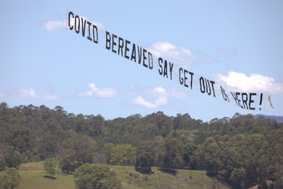 A banner flown over the set of I’m a Celebrity, Get Me Out Of Here! on the NSW-Queensland border directed at former UK health secretary Matt Hancock.
