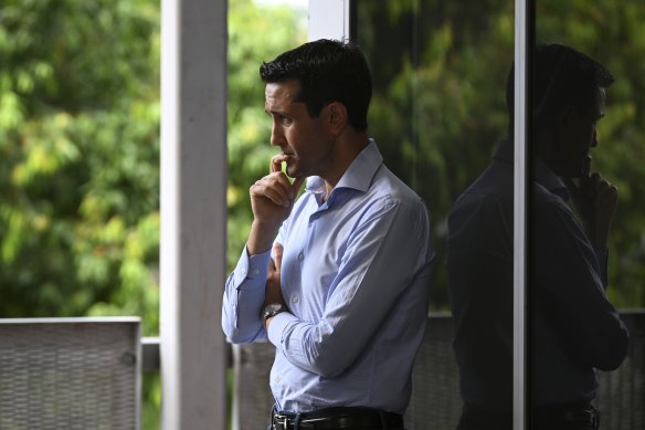 Queensland Opposition Leader David Crisafulli watches the newest member of his parliamentary LNP team, Darren Zanow, speak to reporters Saturday’s Ipswich West byelection win. A full state election in October now awaits.
