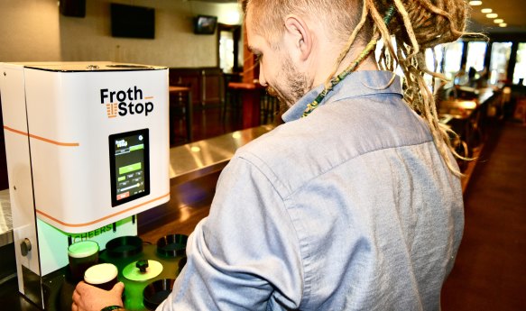 The FrothStop, a robotic drinks dispenser.