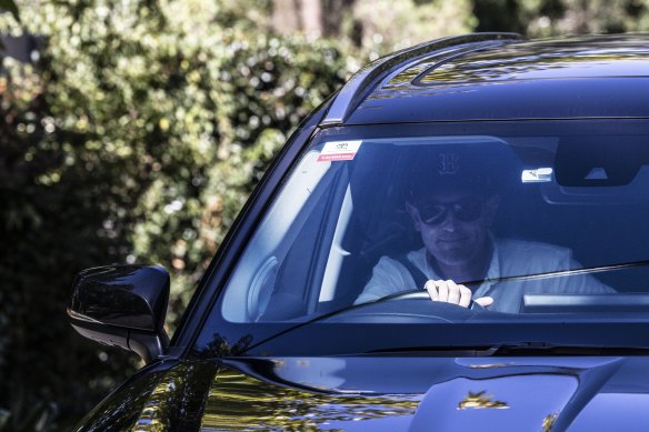 Former premier Dominic Perrottet  leaves his place briefly and then returns before his former staff arrive at his home for a barbecue in Beecroft.