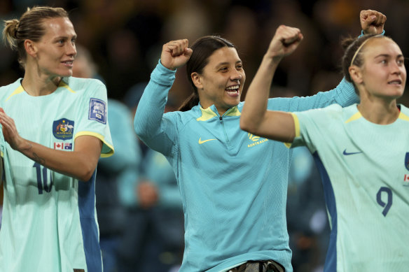 Australia’s Emily Van Egmond, Sam Kerr and Caitlin Foord celebrate their 4-0 win against Canada in Melbourne on Monday.