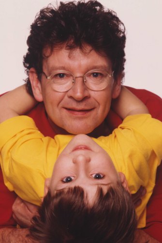 With Samuel at a Father’s Day shoot in 1995: “All credit goes to Samuel for staging the scenario. He had an adorable smartness about him,” says Symons.