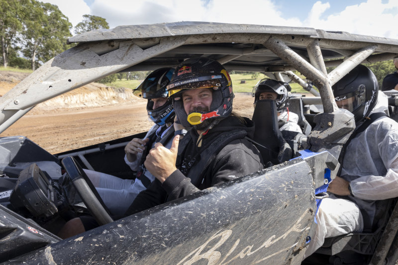 Burning interest: Two-time Paris-Dakar winner Toby Price at the wheel ahead of a hot lap around the circuit on Tuesday.