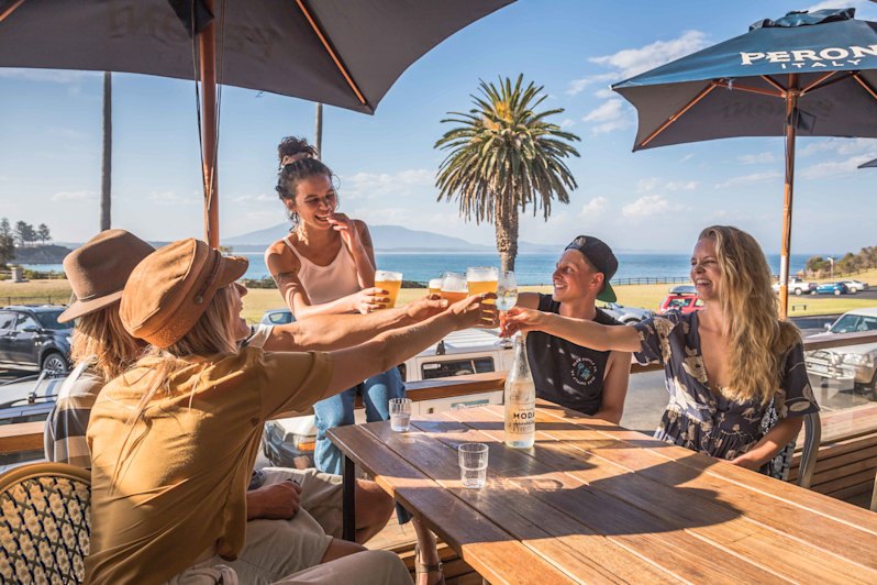 ‘Iconic venue’: Patrons enjoying an afternoon drink at Bermagui Beach Hotel.