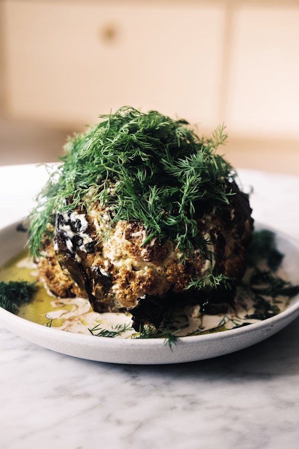 Dill oil and a mountain of dill fronds add wow factor to this whole roasted cauliflower.