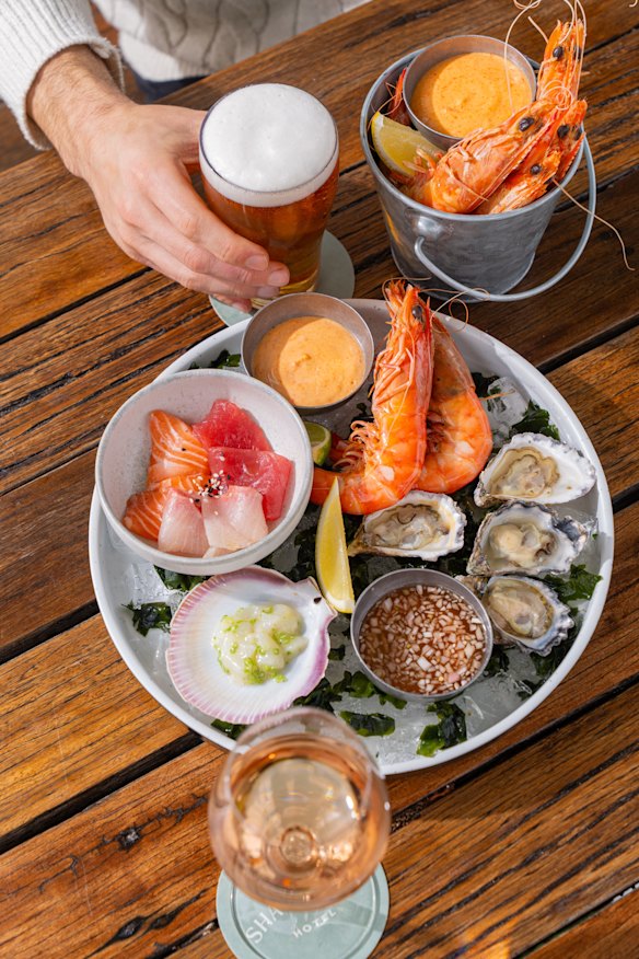 Chilled seafood plate with Ballina prawns, oysters, half shell scallops and daily crudo. 