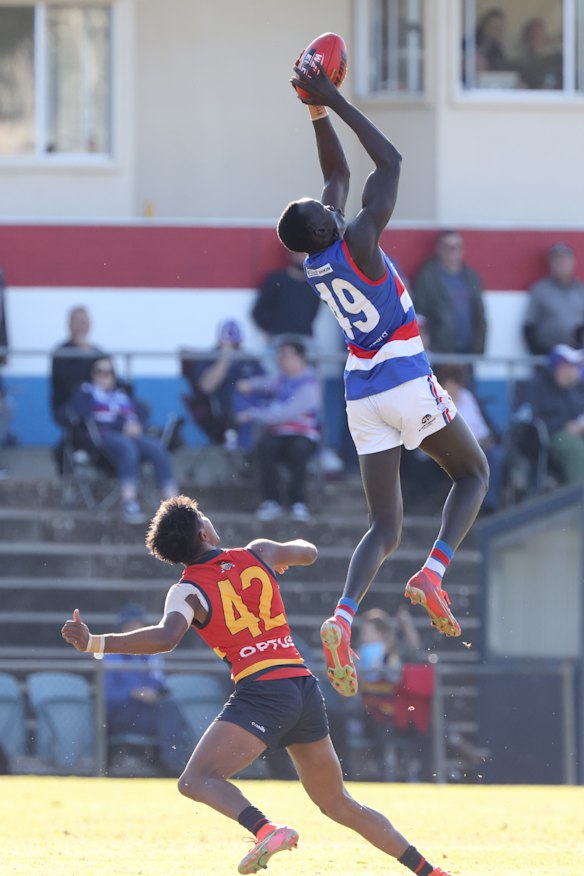 Giant leap: Leek Alleer, right, takes a mark. 